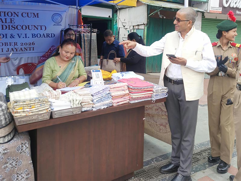 Visitors buying Khadi products at the sales desk