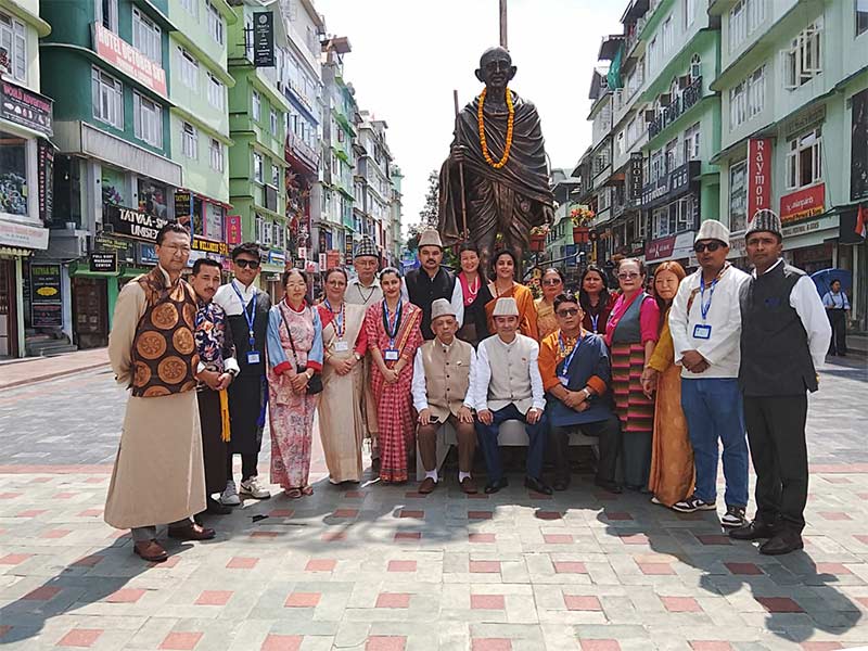 Group photograph at the Mahatma Gandhi statue, MG Marg