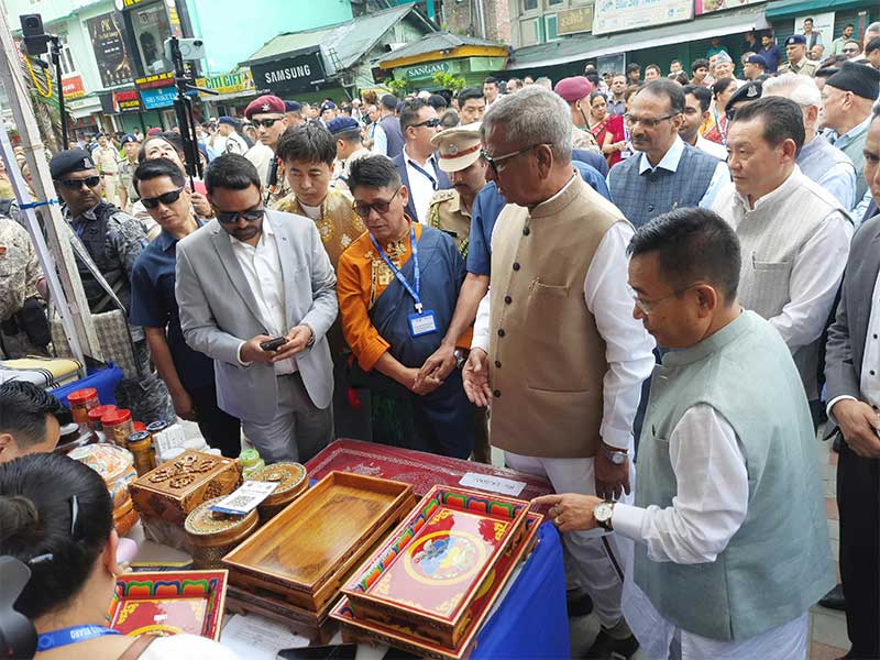 Dignitaries viewing products made by local artisans